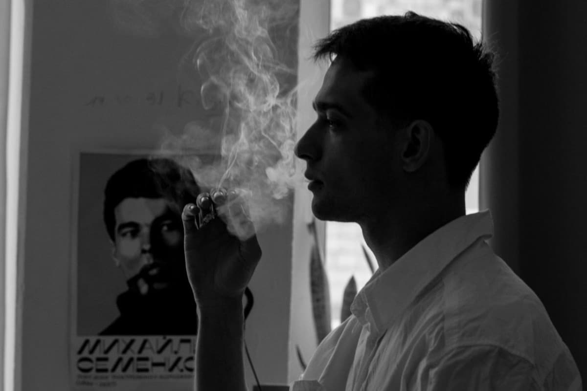 Yevhen Klymenko beside Semenko portrait